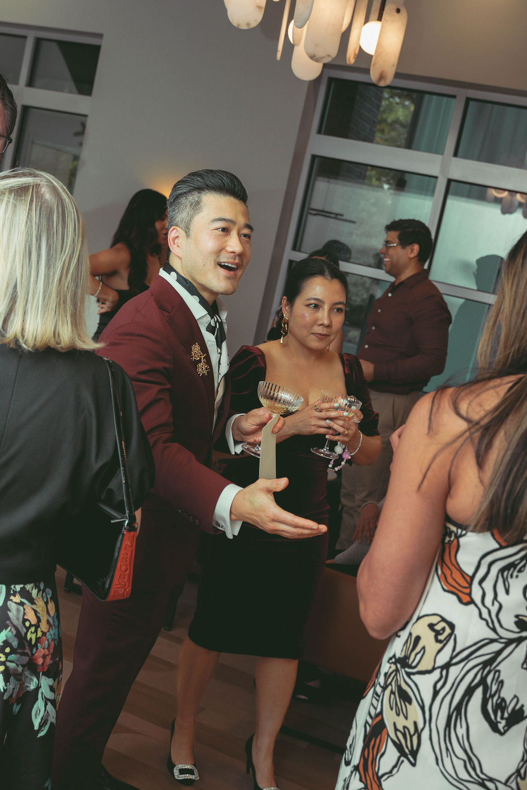 Virginia Beach event design and planning guests mingling during the Virginia Plastic Surgery grand opening celebration designed by Lustre Theory