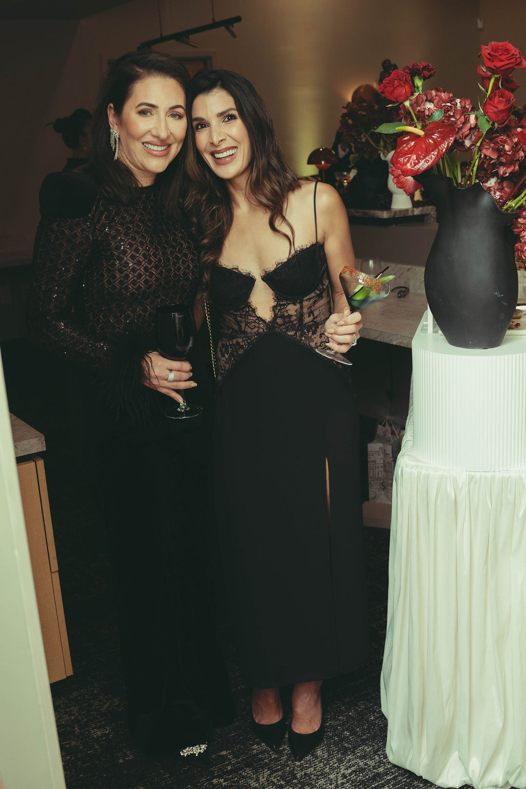 Guests enjoying cocktails and custom event décor at a Virginia Beach grand opening celebration featuring luxury floral design, branded experiences, and event planning by Lustre Theory.