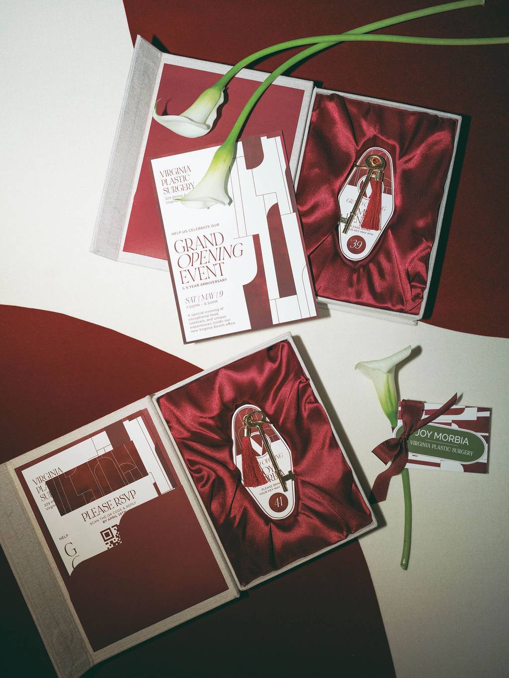 Branded invitation suite, guest gifts, and custom key-themed event details designed for a Virginia Beach grand opening celebration featuring luxury event branding and production by Lustre Theory.